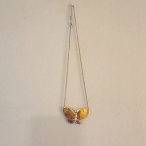 Avon silve tone chain with two tone butterfly.